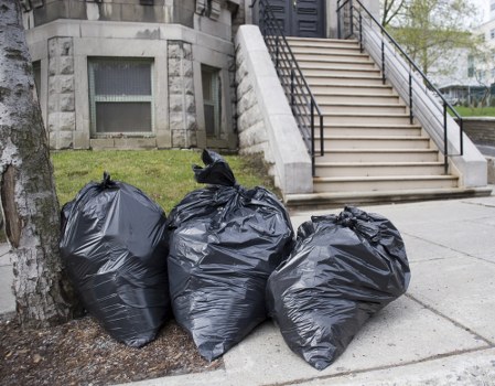 Residential property with a skip container installed for waste disposal